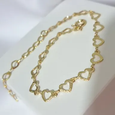 Foto de pulseira corações vazados cintilante