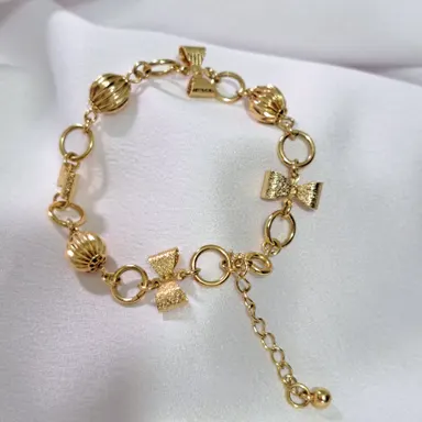 Foto de pulseira laço cintilante e esfera diamantada