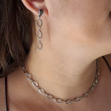 Foto de conjunto elos diamantados em aço inox