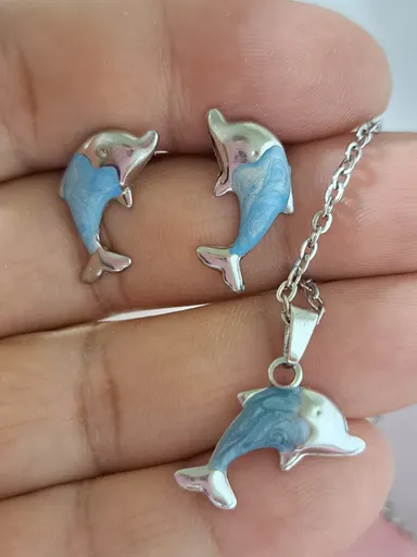 Foto de conjunto golfinho resinado em aço