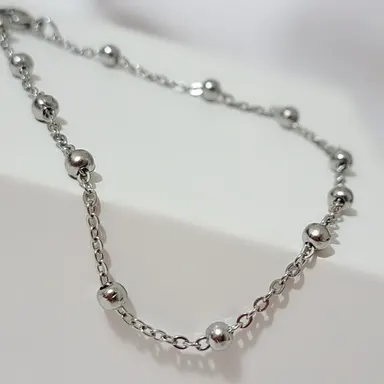 Foto de tornozeleira com bolinhas de 4mm em aço inox