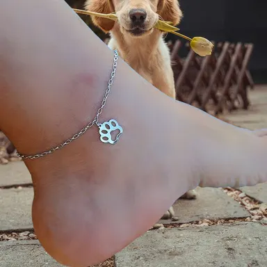 Foto de tornozeleira pata de cachorro em aço inox