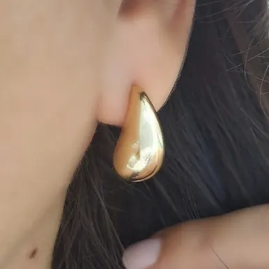 Foto de brinco gota g