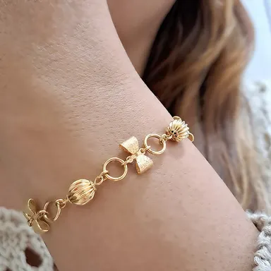Foto de pulseira laço cintilante e esfera diamantada