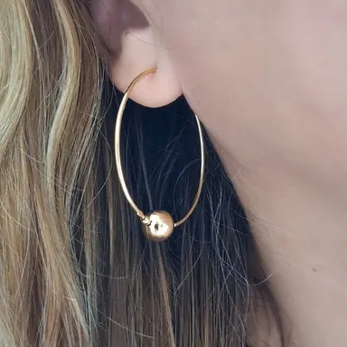 Foto de argola com uma esfera de 9mm
