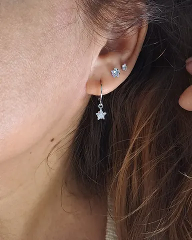 Foto de trio de brincos com pedra estrela aço inox