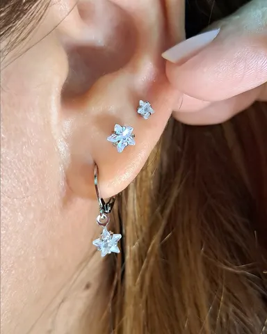 Foto de trio de brincos com pedra estrela aço inox