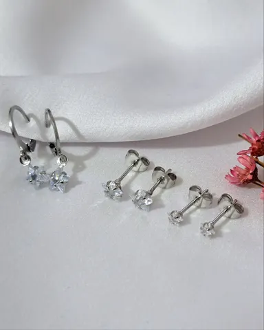 Foto de trio de brincos com pedra estrela aço inox