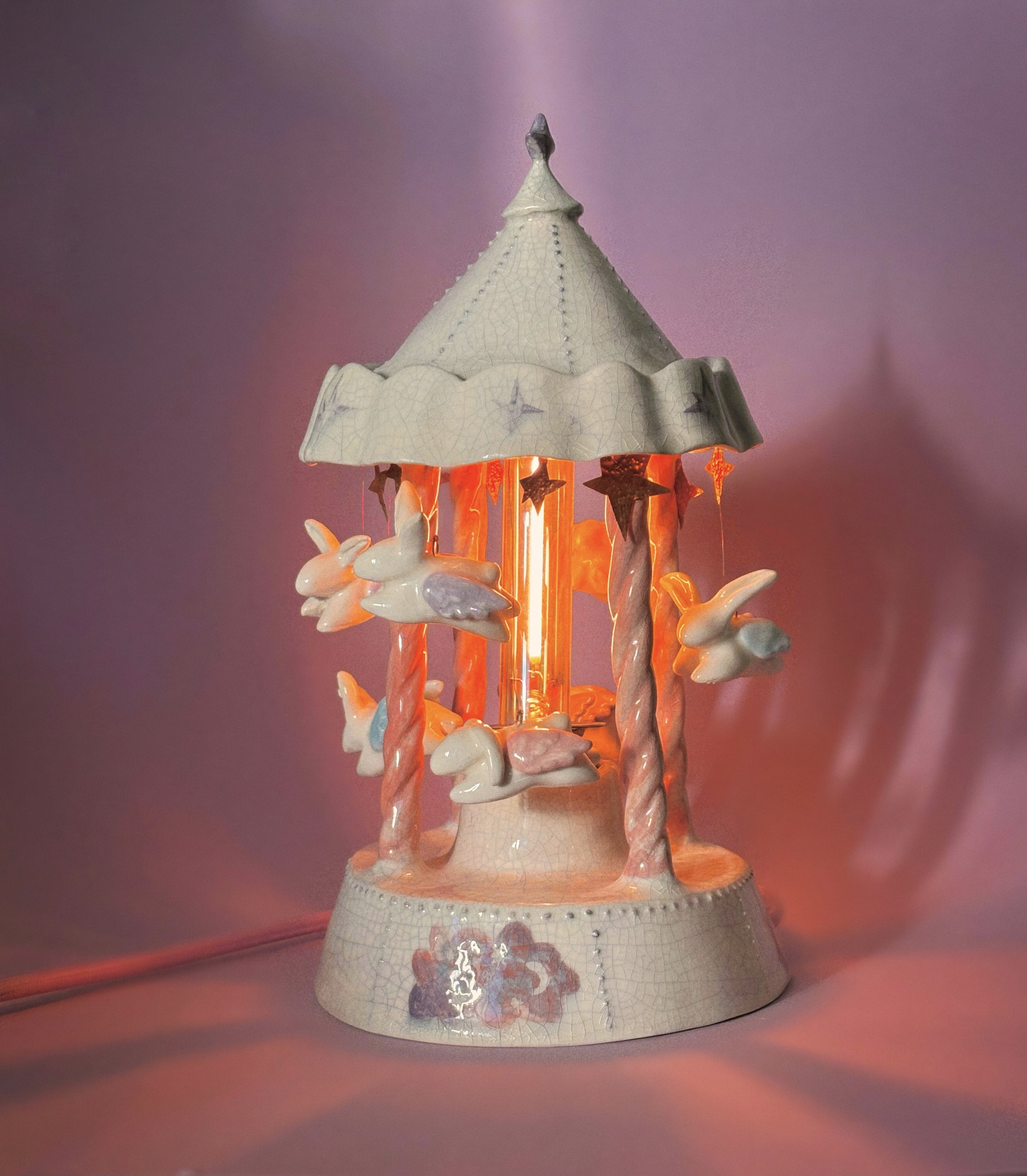 ‘Flying rabbits carousel’ lamp — handmade ceramic lamp by Alisa Merenfeld