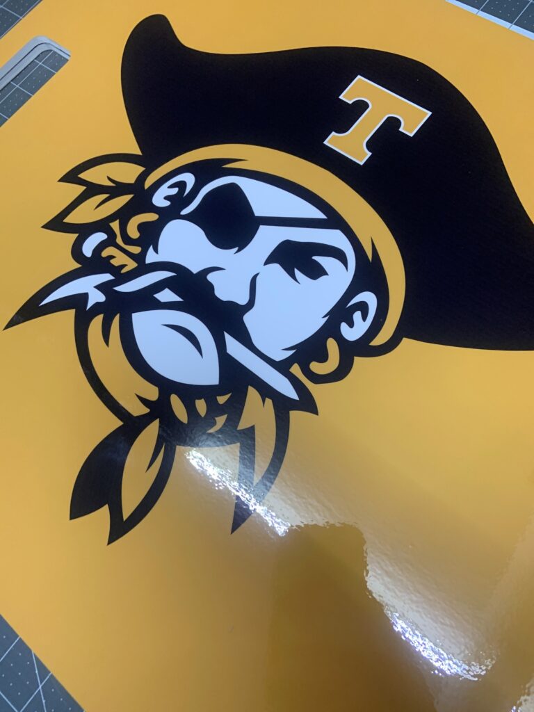 Gloss laminated custom cheer sign for a team celebration