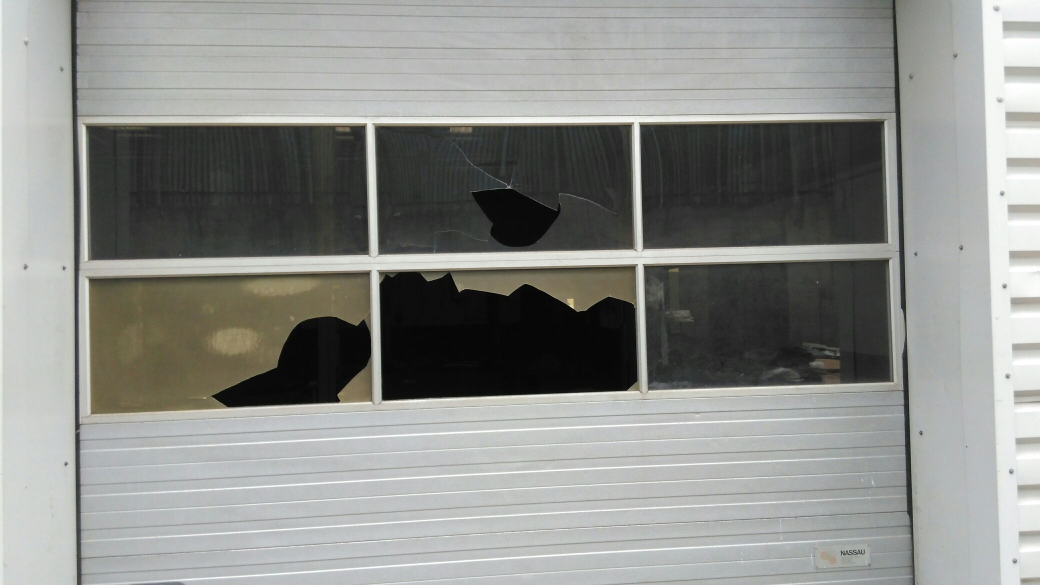 Broken windows at car showroom
