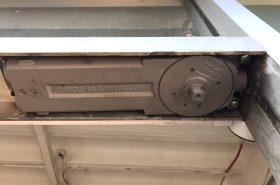 A tricky transom door closer