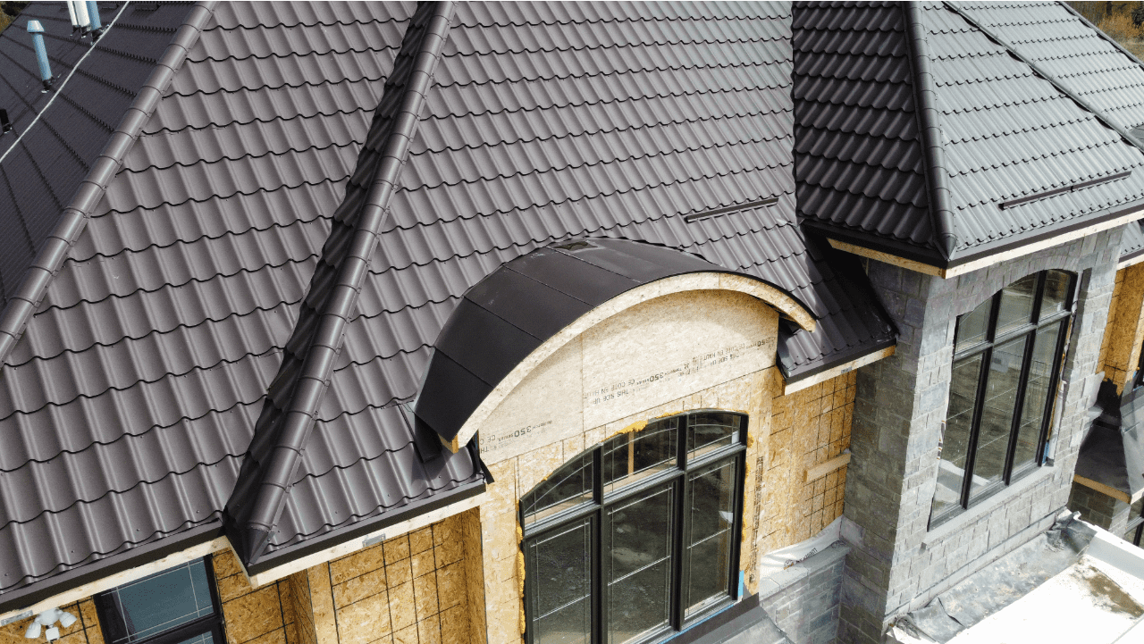 Close-up shot of a metal roof on a new custom home.