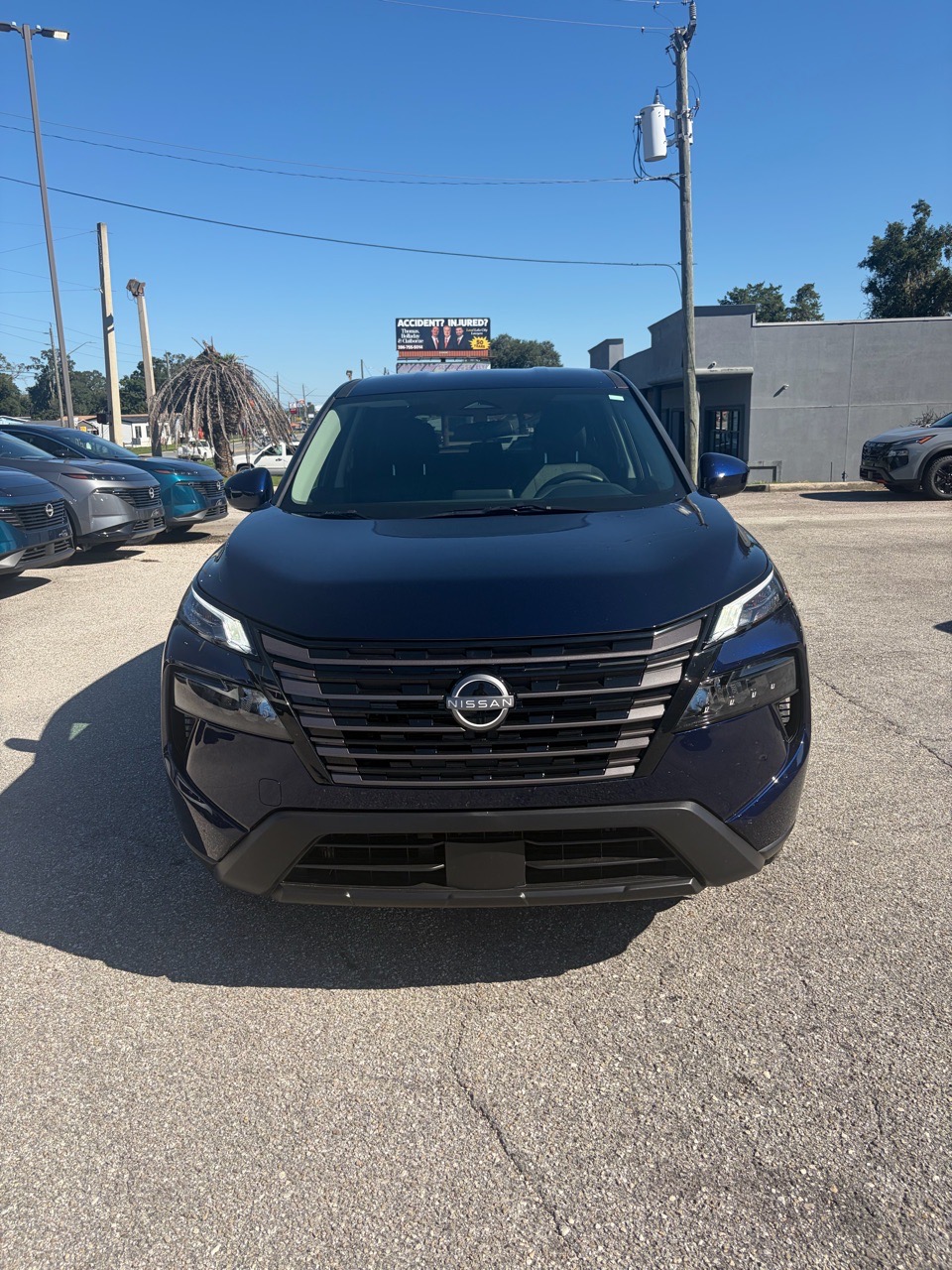2026 Nissan Rogue SV — Deep Ocean Blue Pearl exterior view 2, for sale at Cbrasfield 36 in Lake City, FL