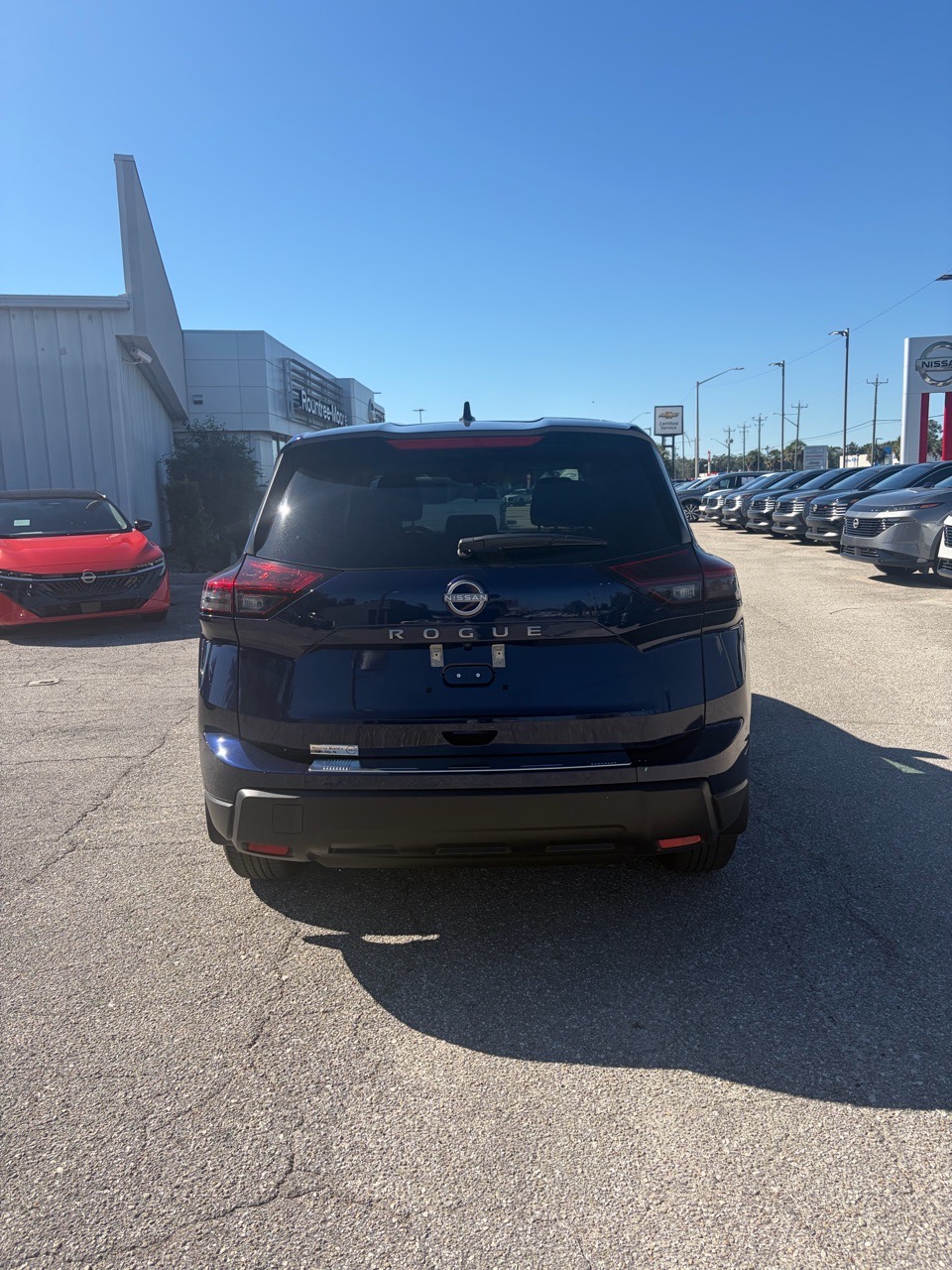 2026 Nissan Rogue SV — Deep Ocean Blue Pearl exterior view 6, for sale at Cbrasfield 36 in Lake City, FL