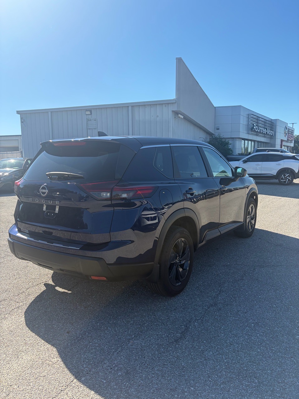 2026 Nissan Rogue SV — Deep Ocean Blue Pearl exterior view 7, for sale at Cbrasfield 36 in Lake City, FL