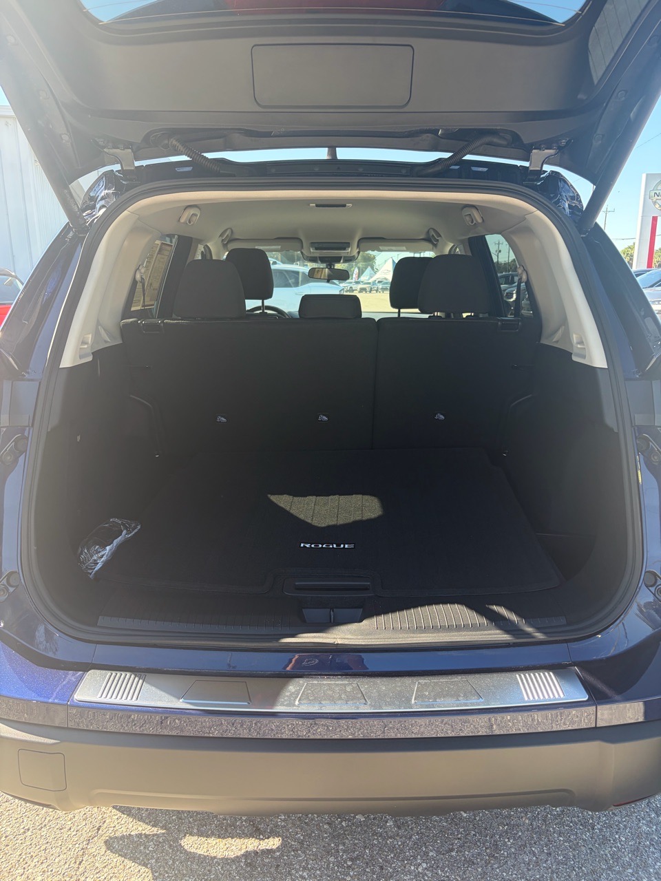 2026 Nissan Rogue SV — Deep Ocean Blue Pearl exterior view 8, for sale at Cbrasfield 36 in Lake City, FL