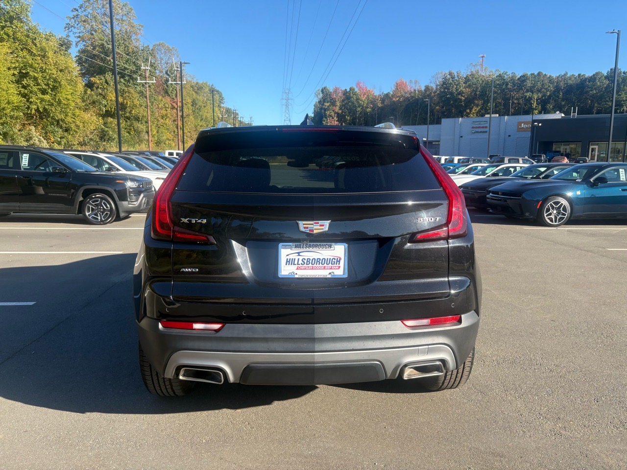2022 Cadillac Xt4 Premium Luxury — Black exterior view 2, for sale at Jkhc 8889 in Hillsborough, NC