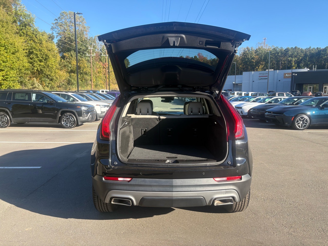 2022 Cadillac Xt4 Premium Luxury — Black exterior view 3, for sale at Jkhc 8889 in Hillsborough, NC