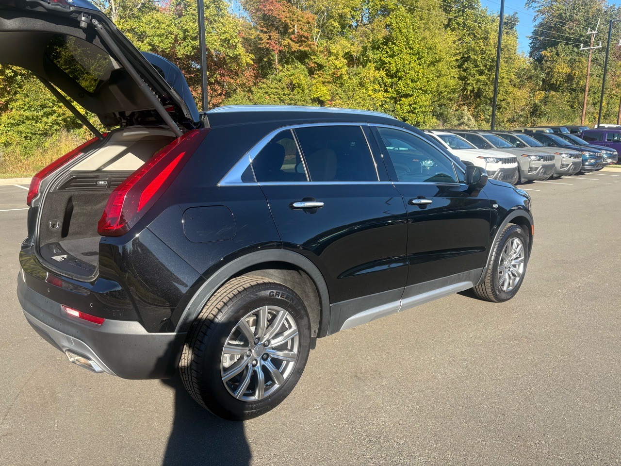 2022 Cadillac Xt4 Premium Luxury — Black exterior view 4, for sale at Jkhc 8889 in Hillsborough, NC