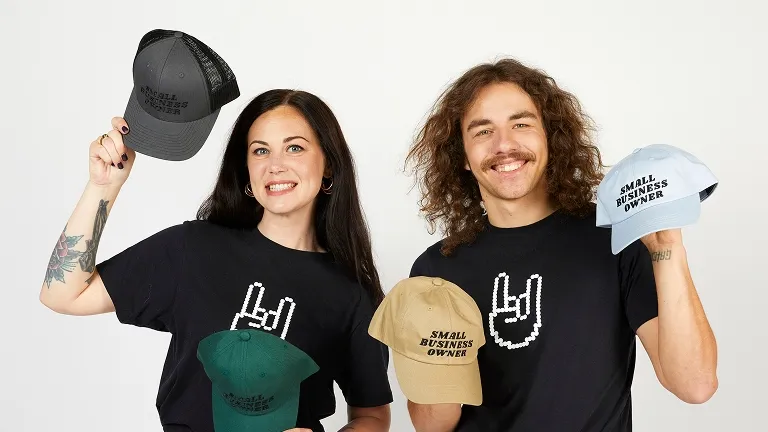 Printify dashboard with custom print-on-demand products including t-shirts, mugs, hoodies, and tote bags