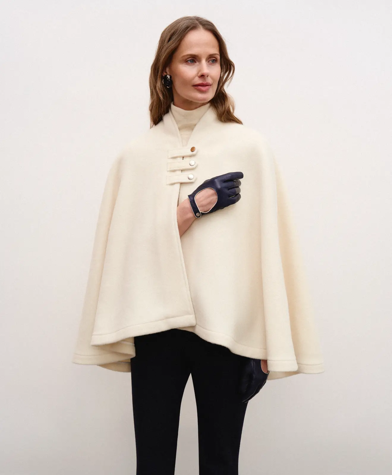 Creamy white wool and cashmere poncho Swan in a classic old money aesthetic