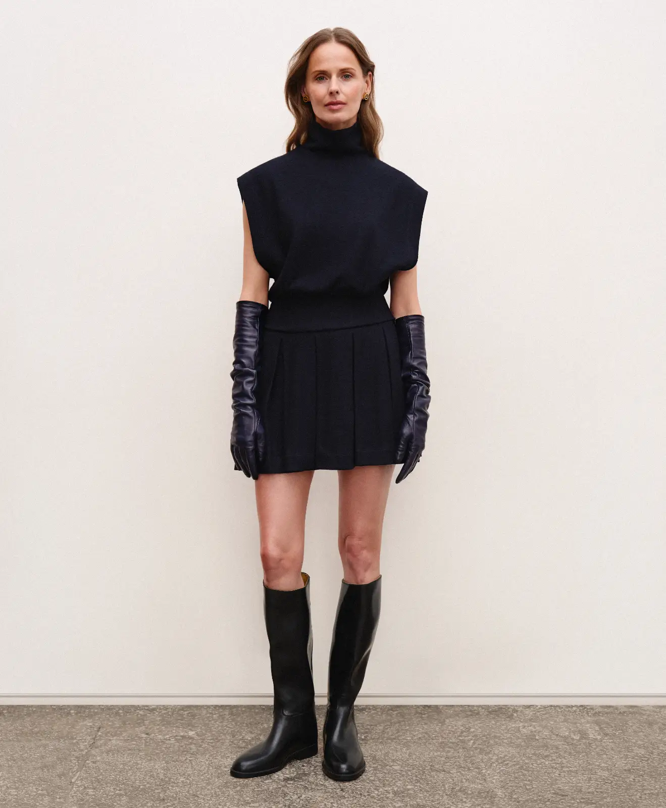 Classic women’s designer mini skirt in old money style, navy blue