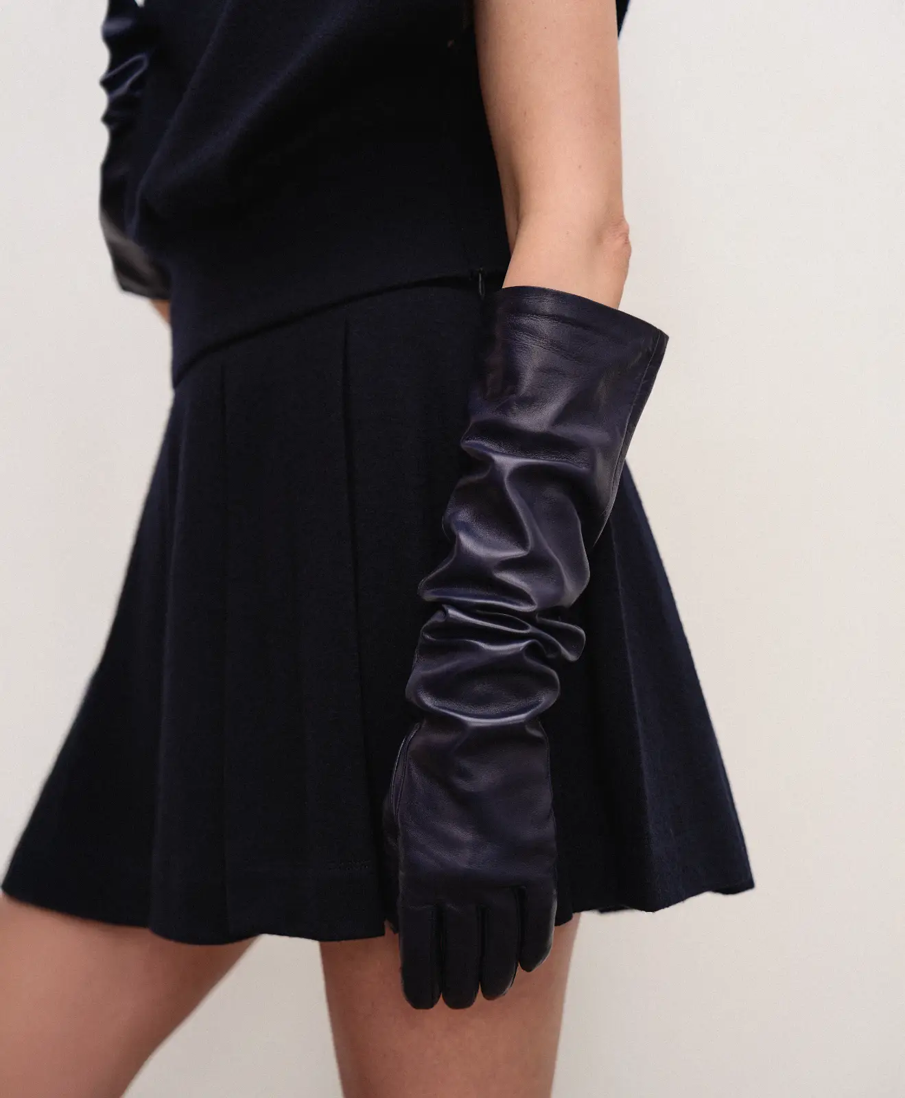 Classic women’s designer mini skirt in old money style, navy blue