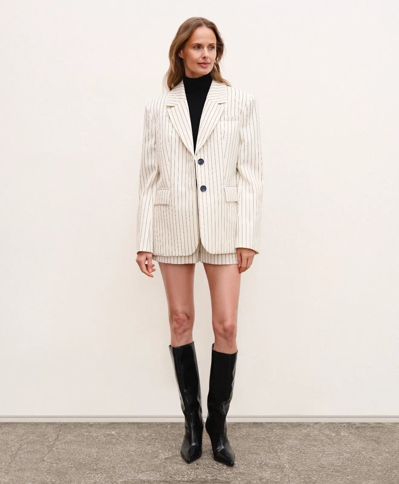 Classic tailored wool shorts with pleats for women in old money style