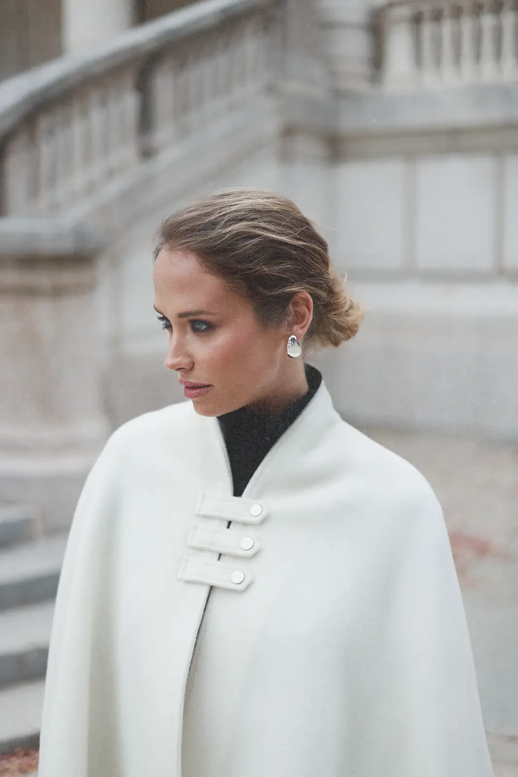 Creamy white wool and cashmere poncho Swan in a classic old money aesthetic