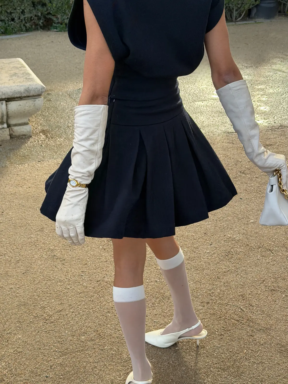 Classic women’s designer mini skirt in old money style, navy blue