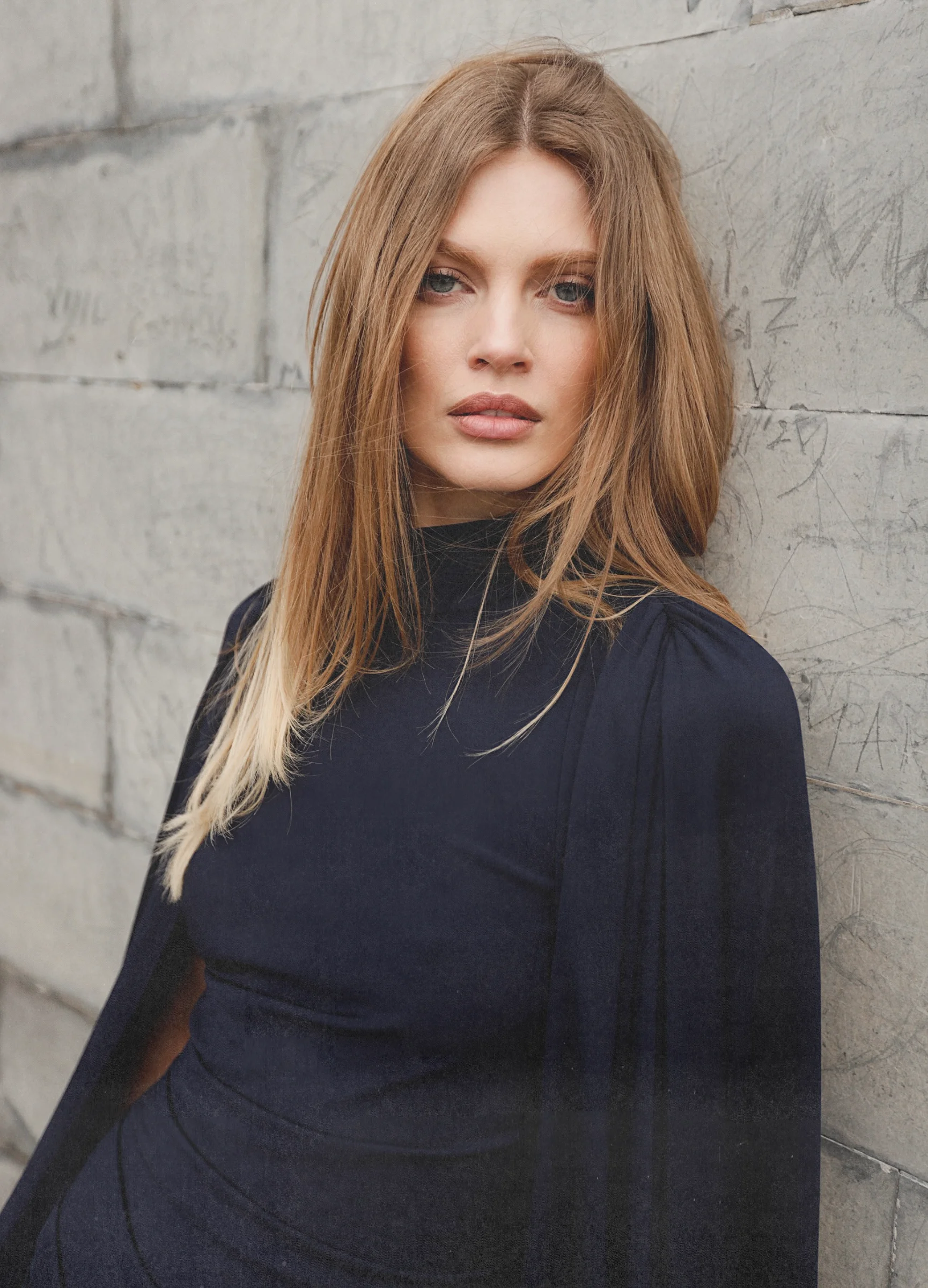 Sophisticated navy mini dress in old money aesthetic with cape 