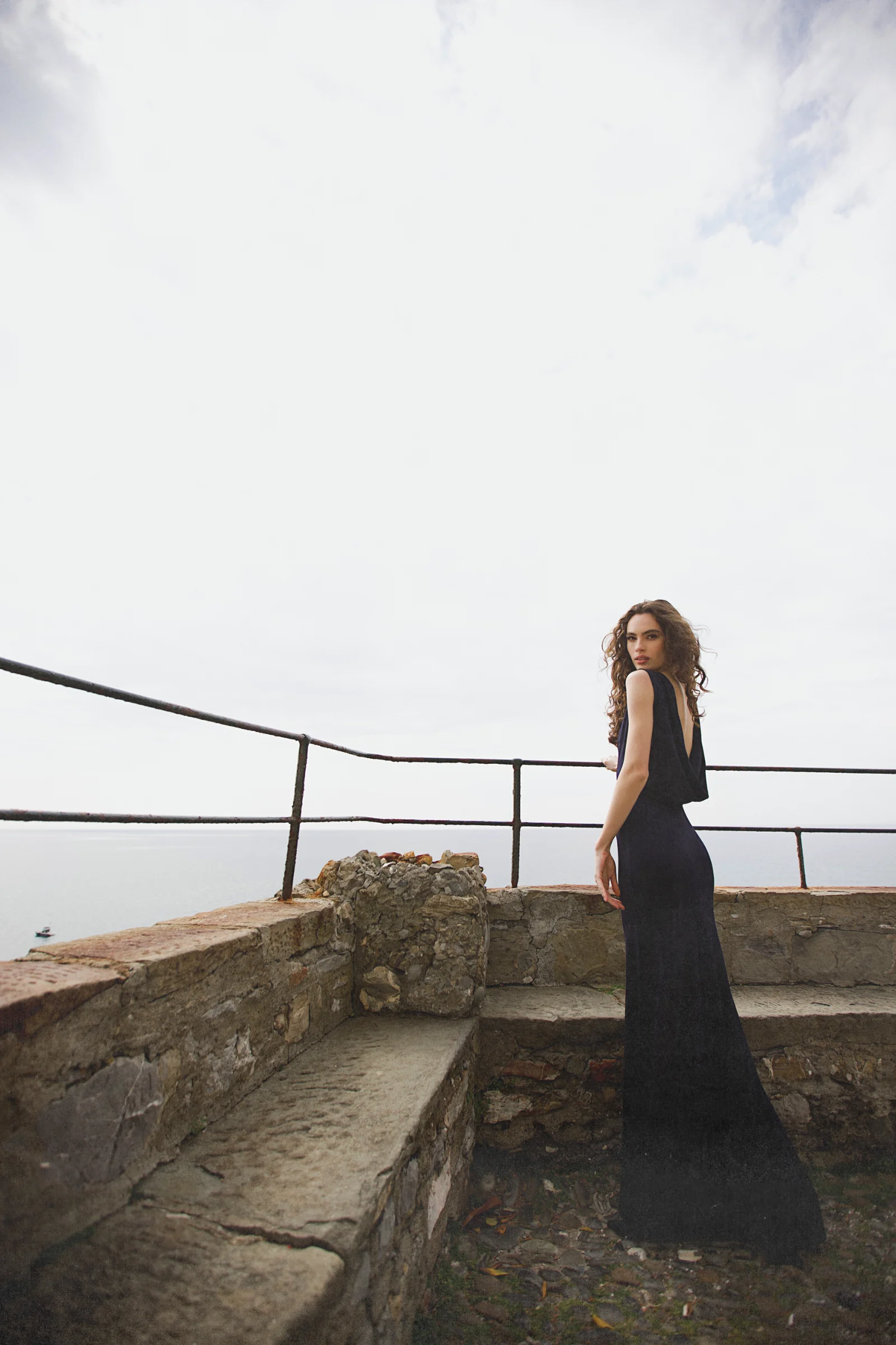 Sophisticated Riviera maxi dress with open back detail and elegant train in a rich blue