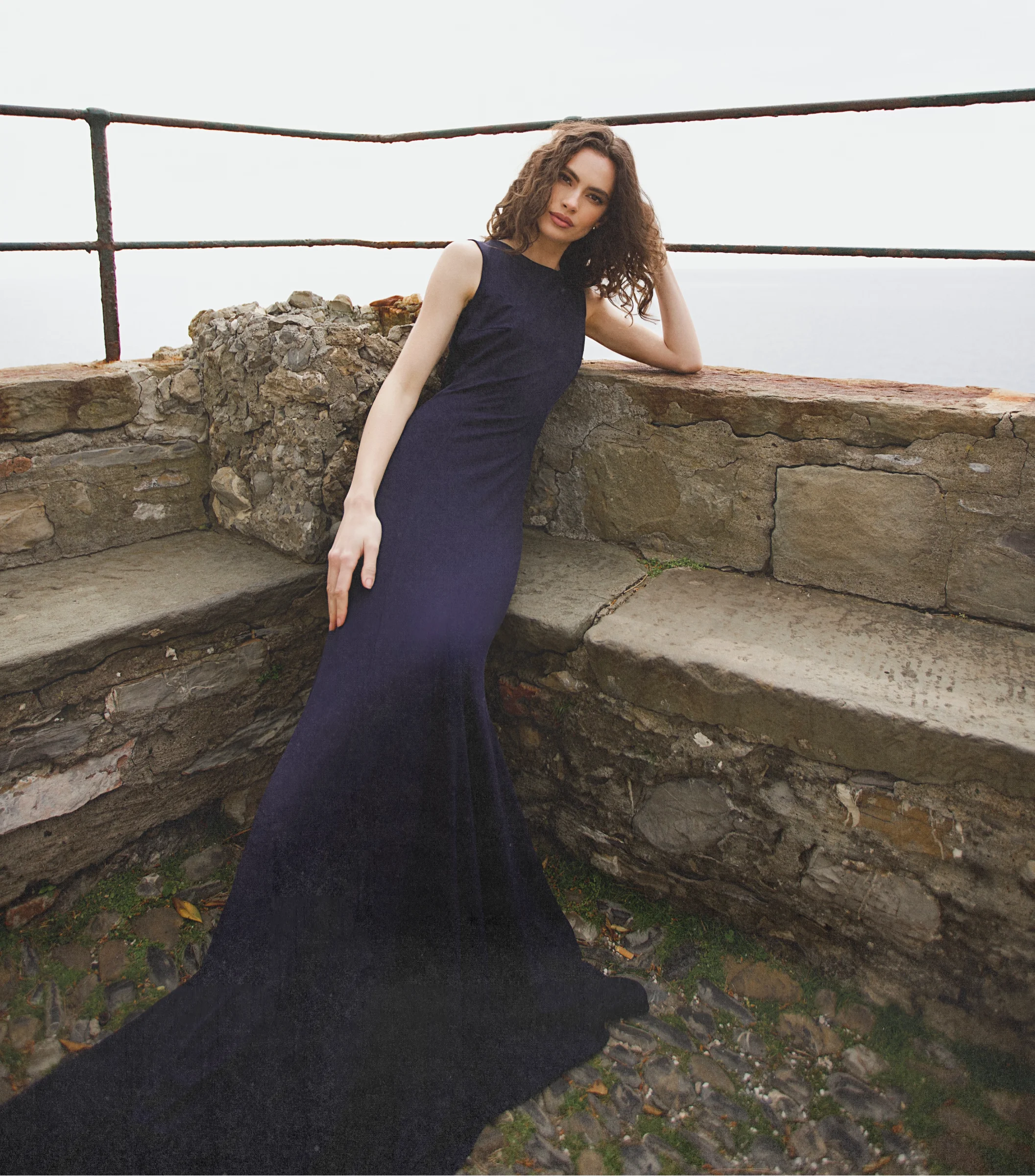 Sophisticated Riviera maxi dress with open back detail and elegant train in a rich blue