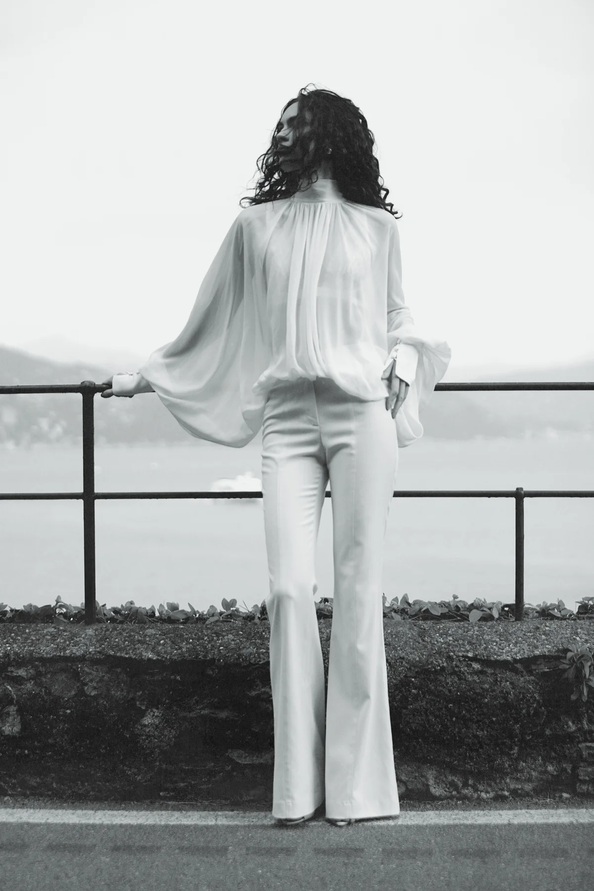 White silk blouse Dolce with voluminous sleeves, a fluid drape and scarf-neck detail