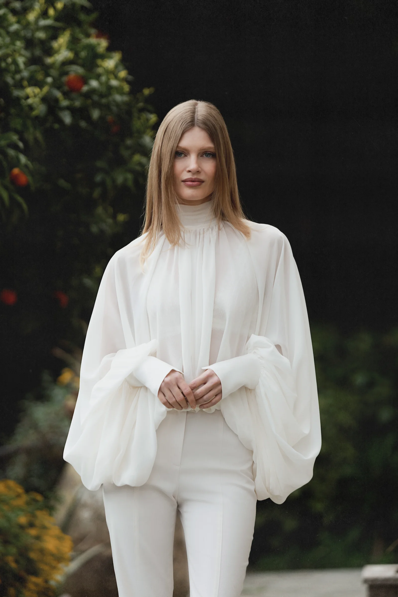 White silk blouse Dolce with voluminous sleeves, a fluid drape and scarf-neck detail
