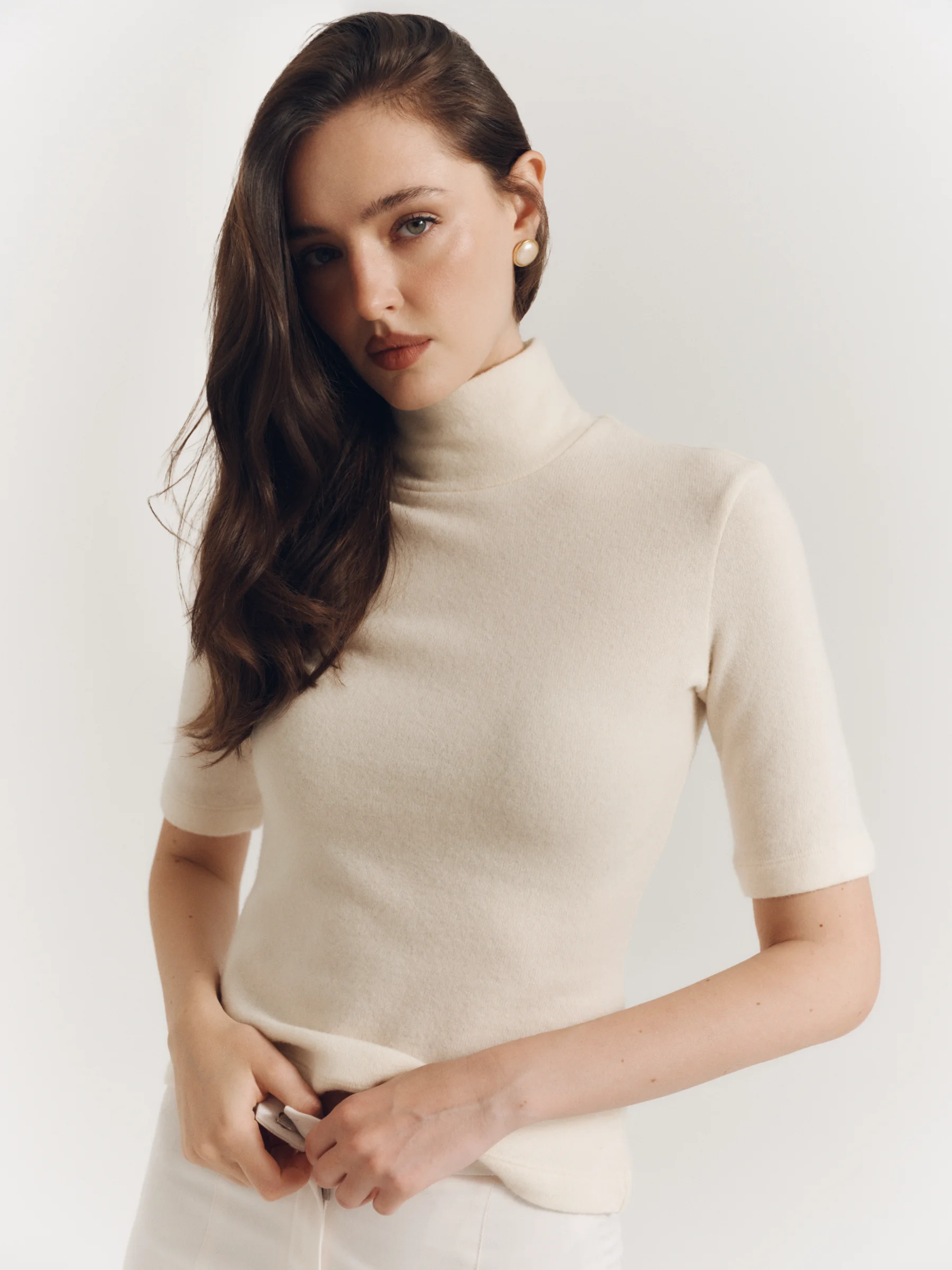Designer elegant fitted cream wool top with high neckline for women in old money style