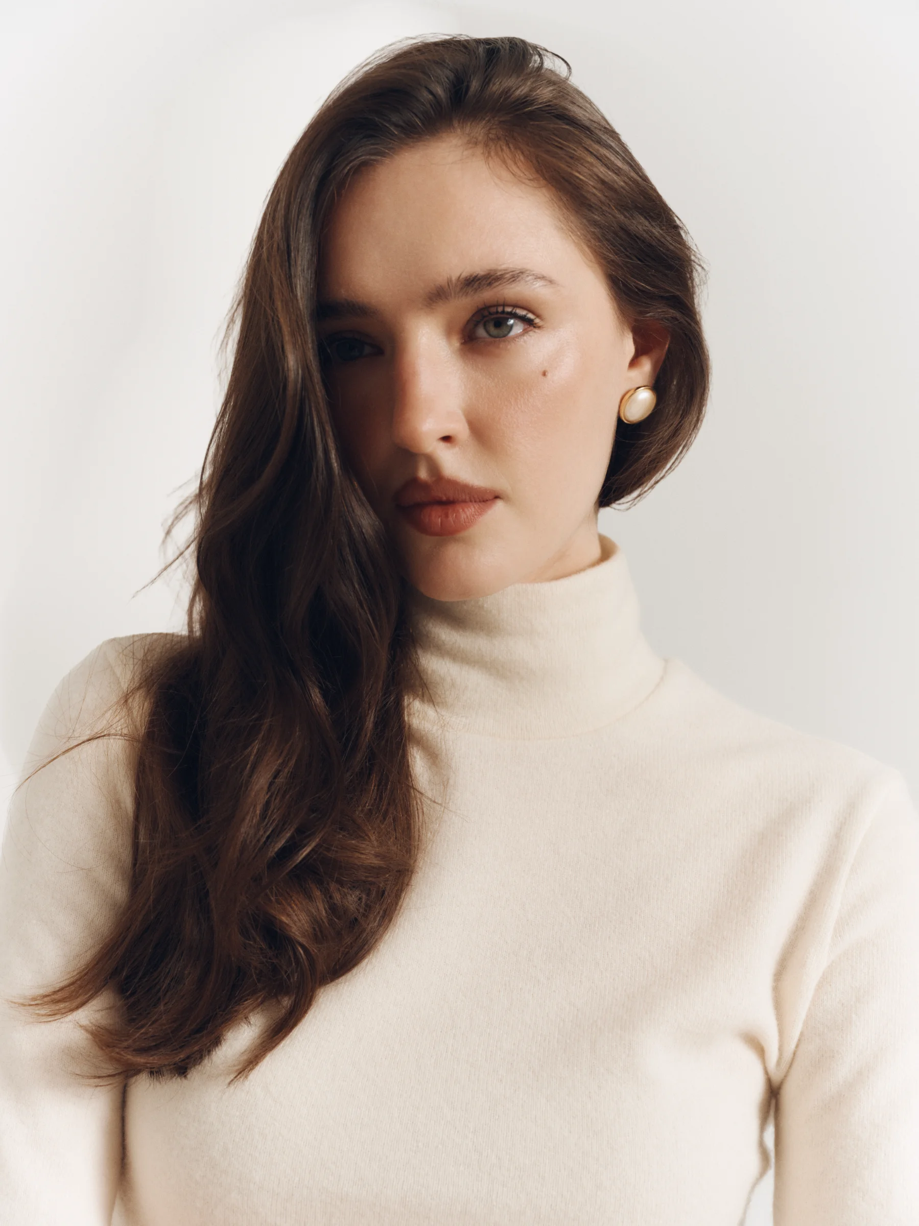 Designer elegant fitted cream wool top with high neckline for women in old money style
