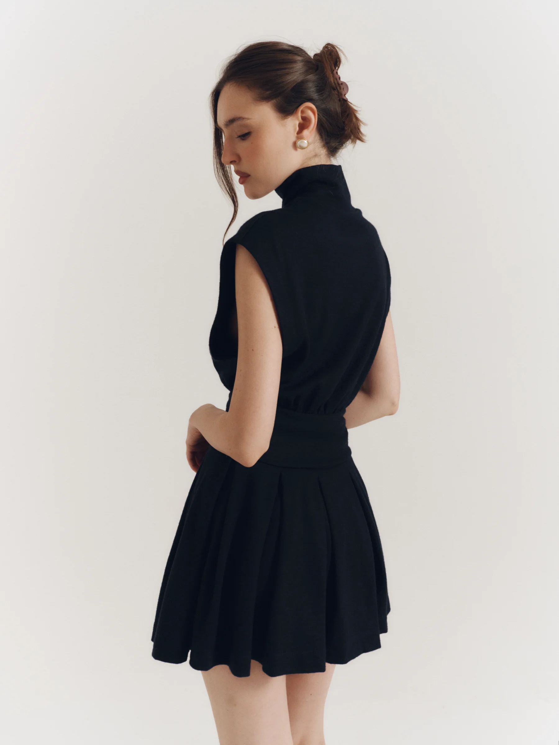 Classic women’s designer mini skirt in old money style, navy blue