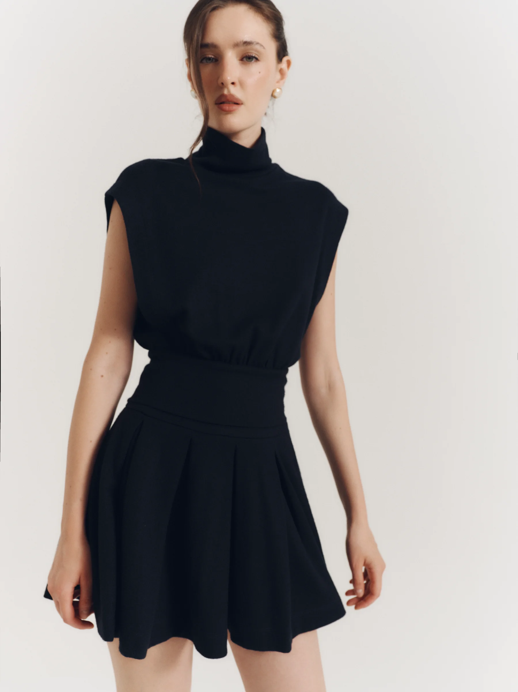 Classic women’s designer mini skirt in old money style, navy blue