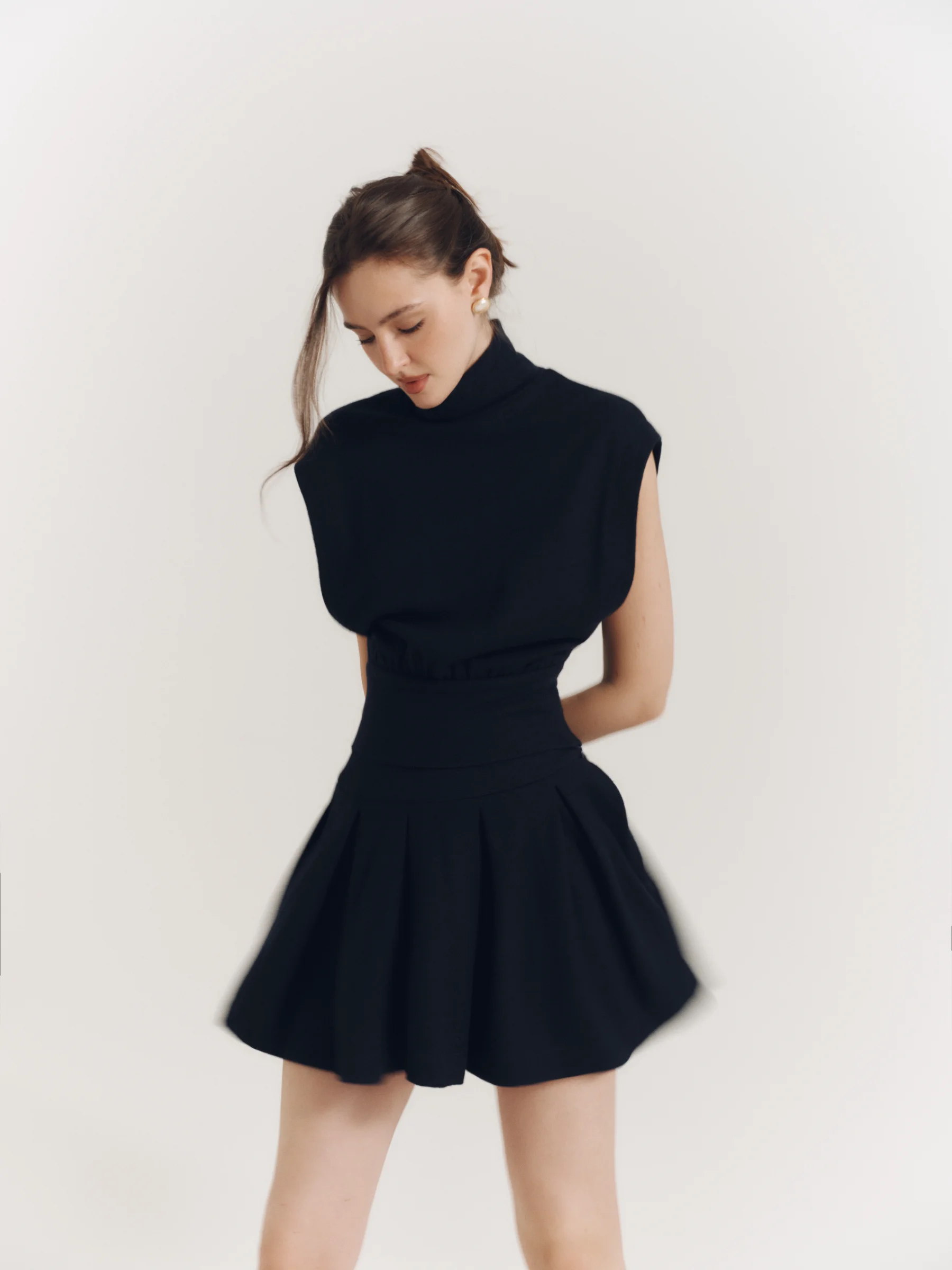 Classic women’s designer mini skirt in old money style, navy blue