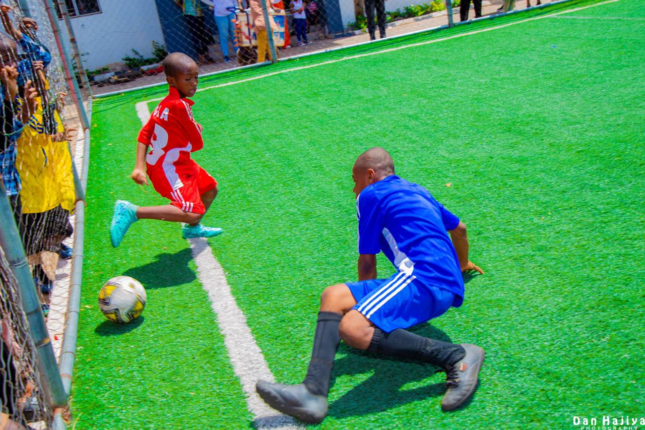 Young soccer players in action