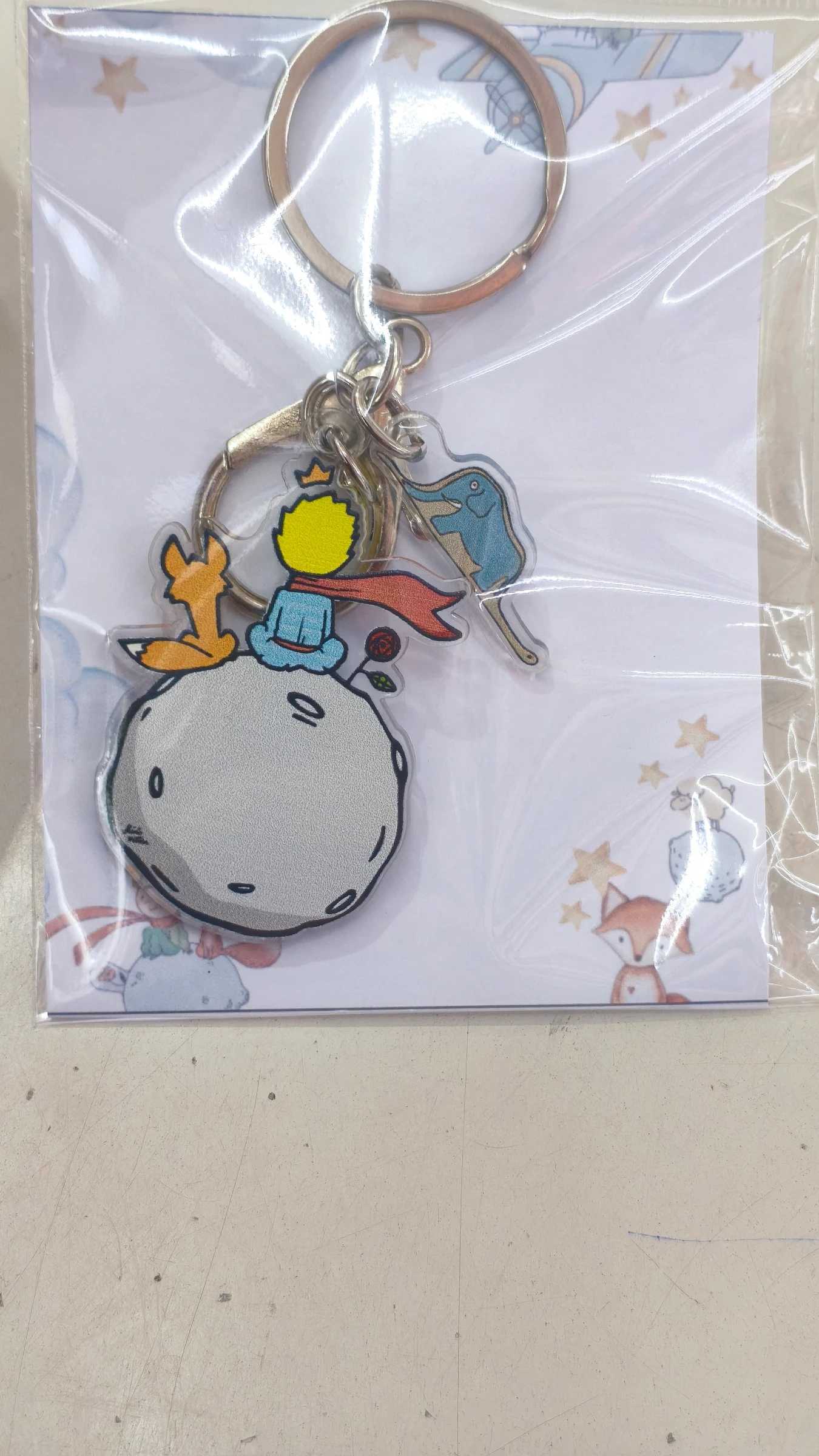 Principito / sentado de espalda luna