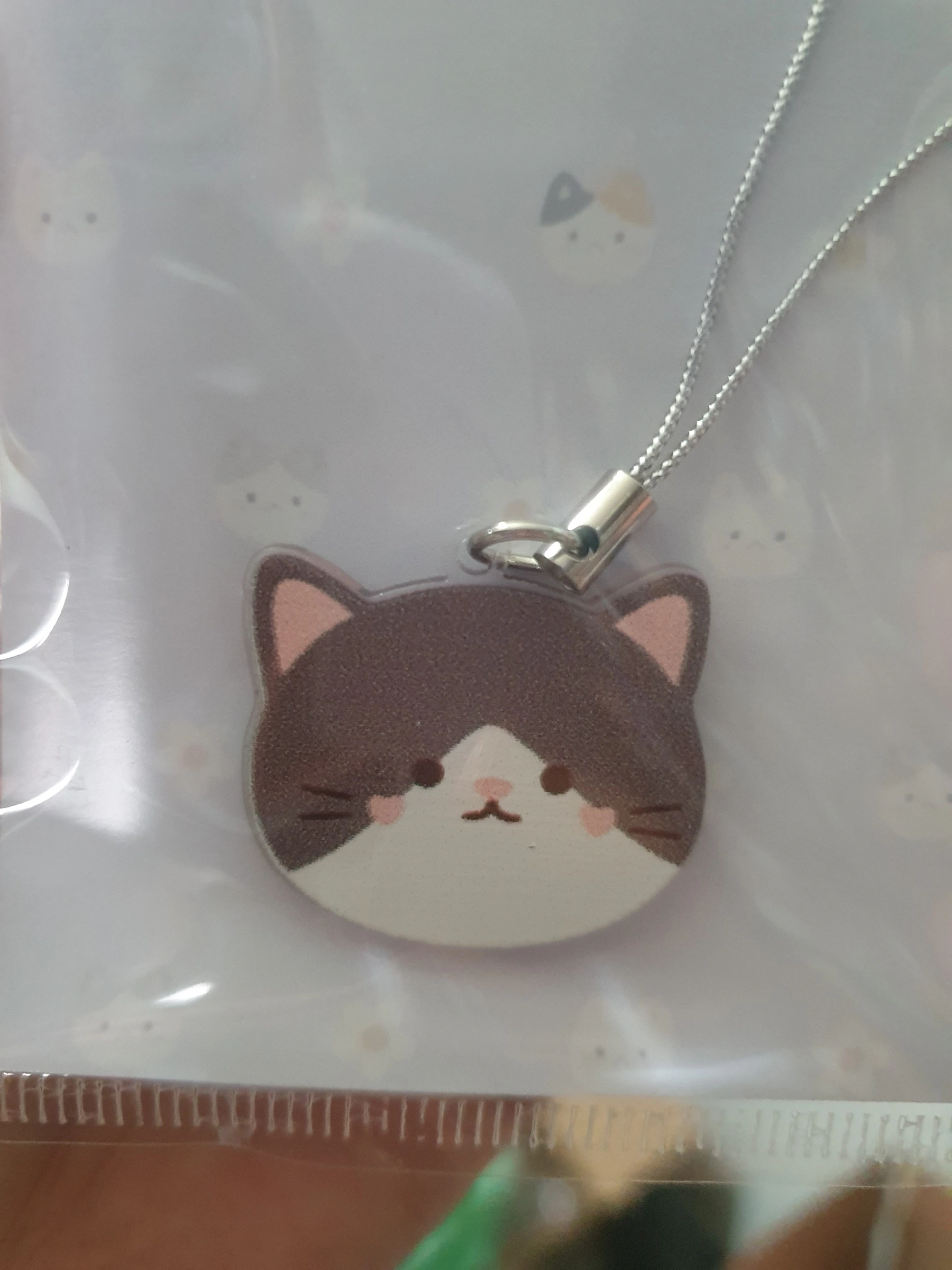 Gatito gris/café y blanco