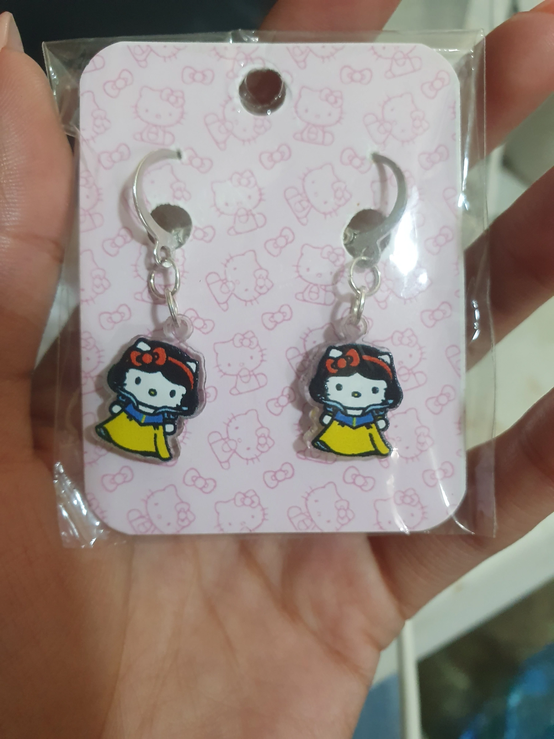Hello kitty/ blanca nieves