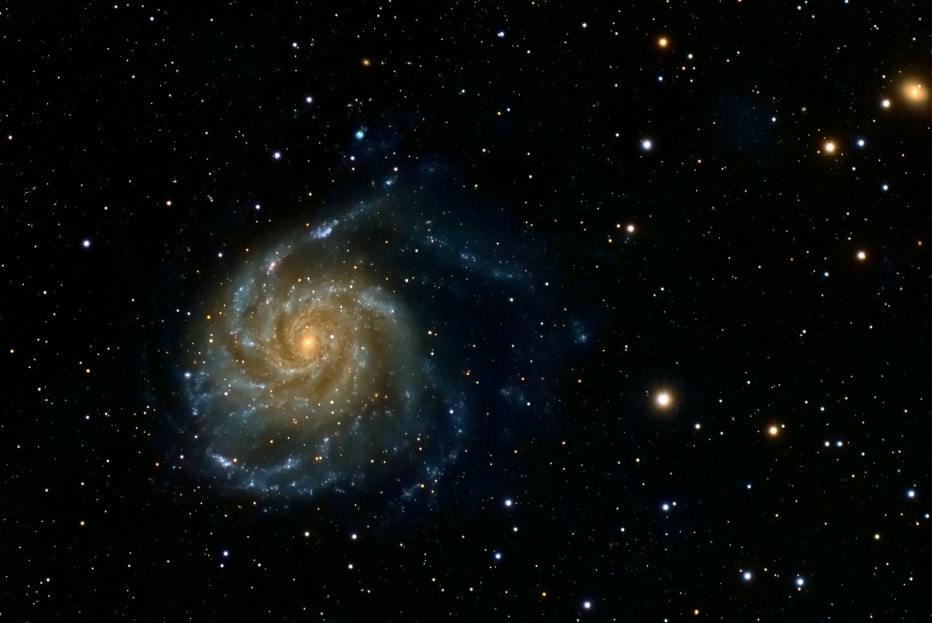 Messier 101 - the Pinwheel Galaxy. A grand-design spiral galaxy that's estimated to be about 21 million light years away