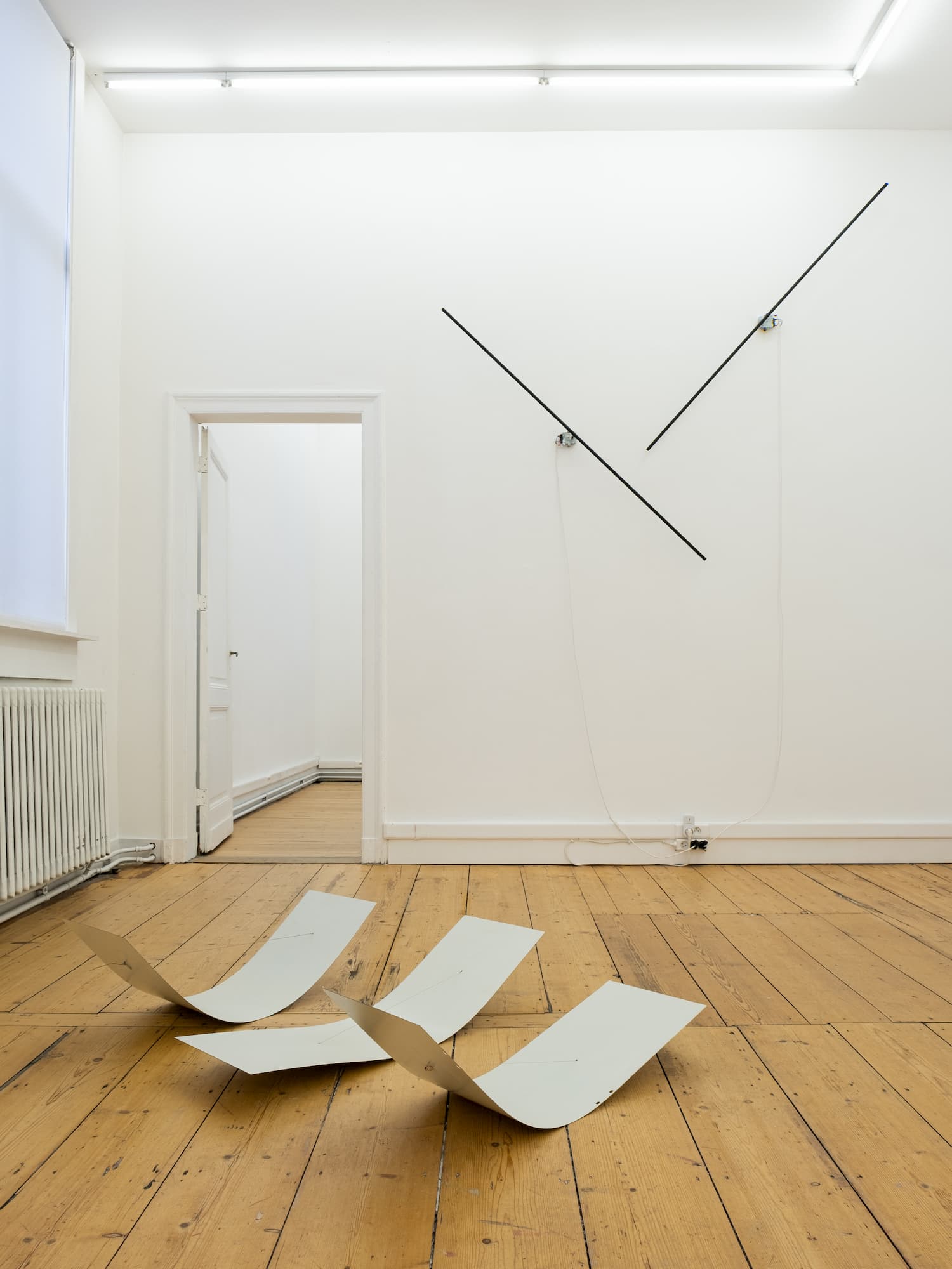 Pipes Mounted on a Wall and New Kind of Musical Instruments on the Floor | by Anna Godzina.