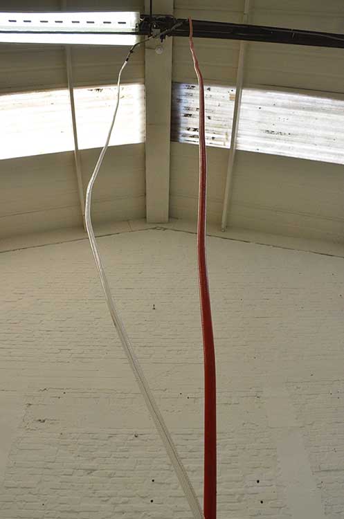 Three Meters Hose, Transparent and Red, in Movement | by Anna Godzina.