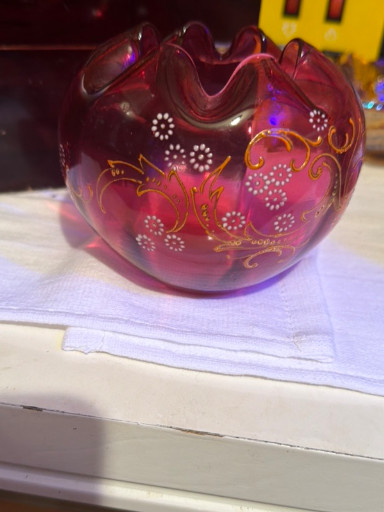 Cranberry glass rose bowl with hand-painted enamel floral decoration and gilt accents