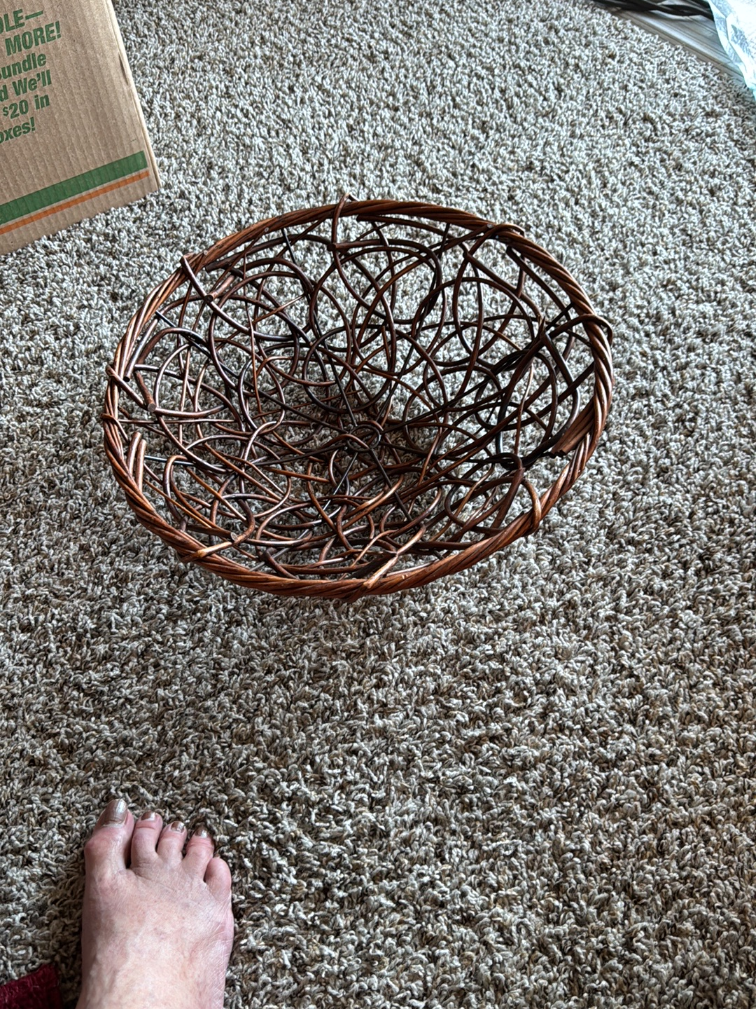 Handwoven copper twig basket